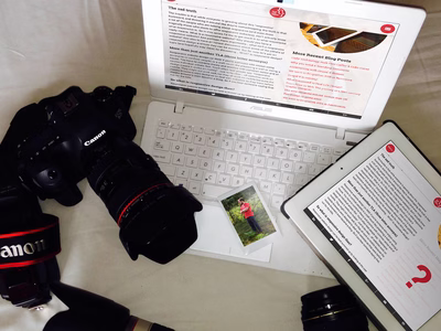 A MacBook and an iPad - the sub-menu is missing from the website on the iPad.