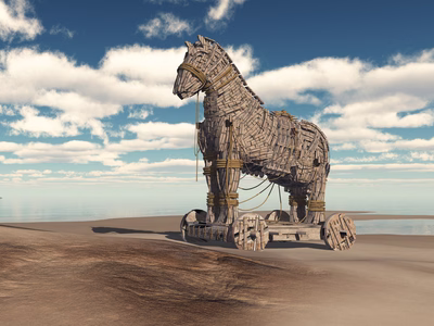 A wood trojan horse in a deserted beach, peaceful scenery blue sky with white clouds. 