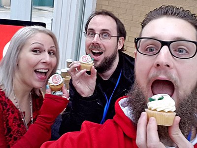 Left to right: Julia, Barry and Darren eating Real Life Digital branded cup cakes.
