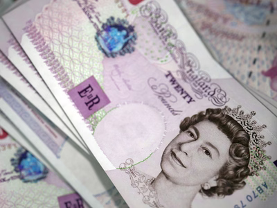 A pile of twenty pound notes.