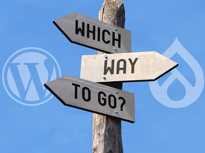 A sign post with writing Which Way To Go in opposite directions with the WordPress logo on the left and the Drupal logo on the right.