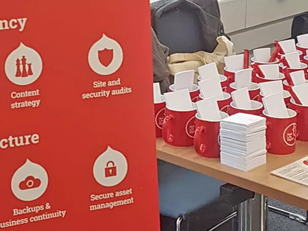 Real Life Digital merchandise stand at DrupalCamp London 2017.