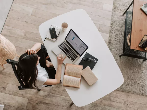 A woman working from home.