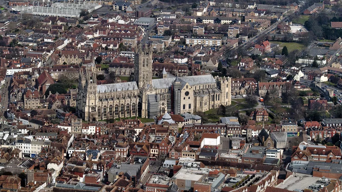 Canterbury cathedral and its surroundings shot from the air.