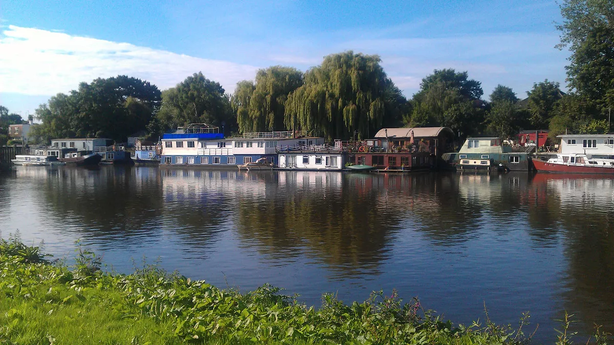 Houseboats on Thames river in Richmond - Surrey - UK.