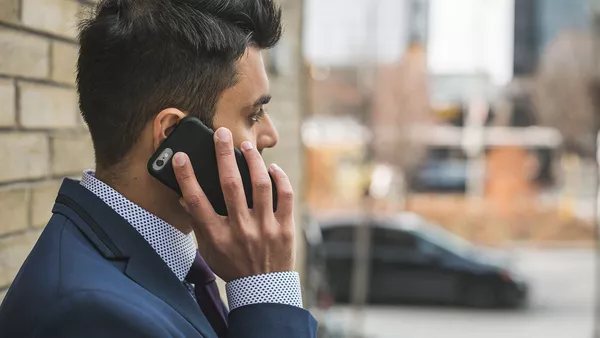 A man on the phone.