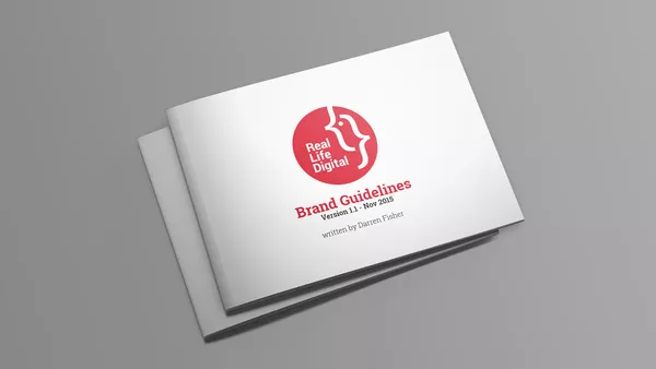 2 closed copies of Real Life Digital's branding document showing the cover.