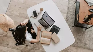 A woman working from home.