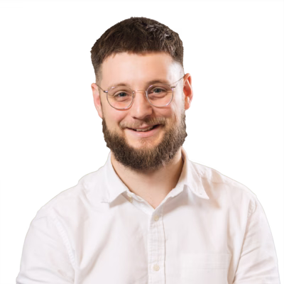 Darren Fisher, Creative Director at Pivale Drupal agency - a bearded man with dark hair and glasses.